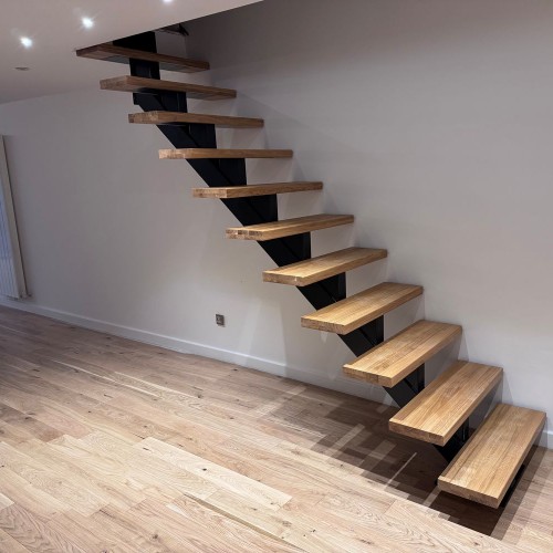 Steel Spine Staircase with Oak Treads, London SE8 Steel Spine Staircase with Oak Treads, London SE8
